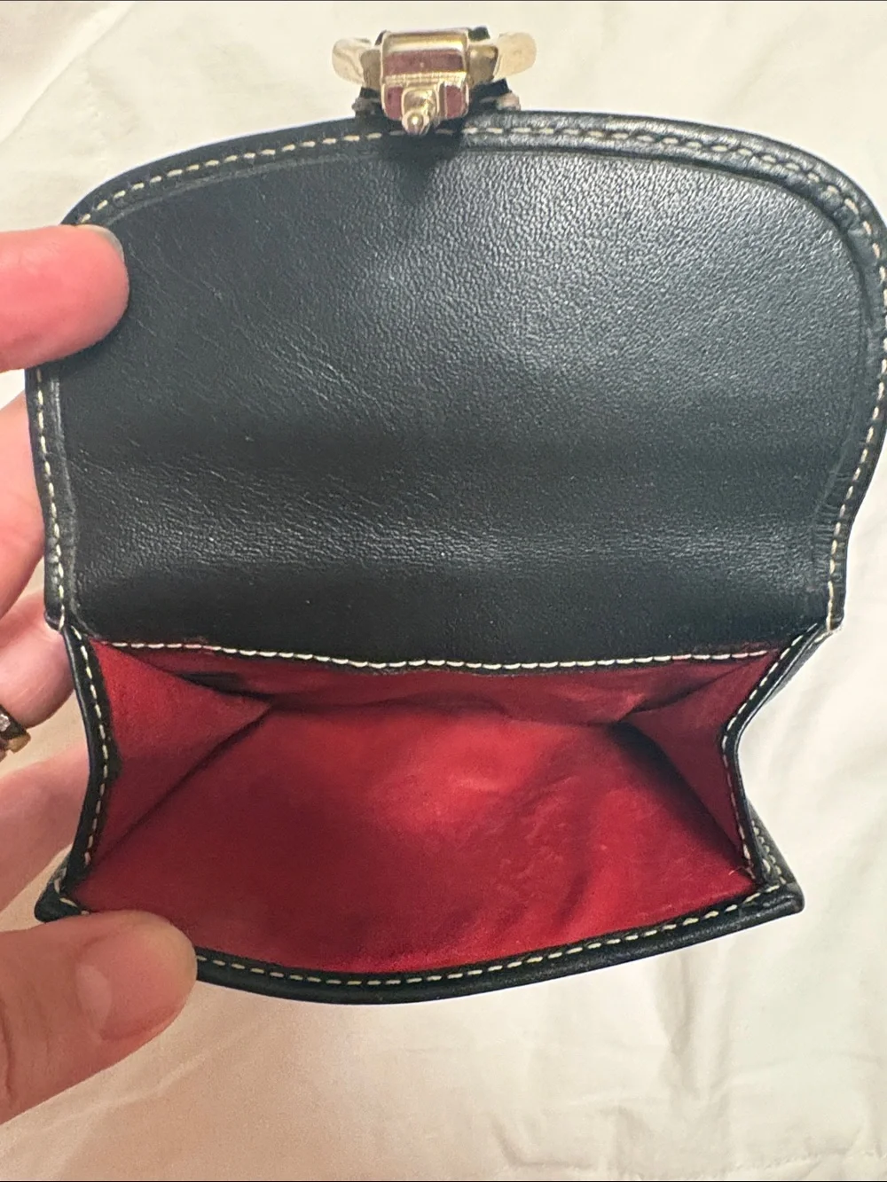 Dooney & Bourke Tan Wallet with Black Trim and Gold Hardware